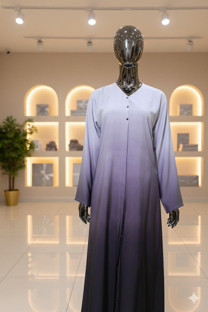 Gradient dress on a mannequin in a store setting with lights and decor.